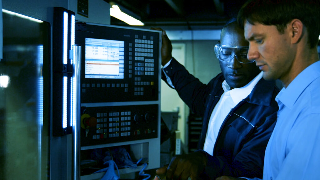 PEC Specialists configuring a process control system 